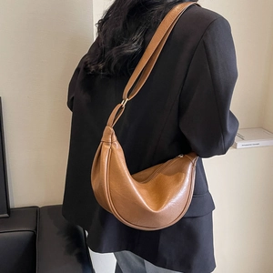 Retro brown leather crescent shoulder bag with large capacity for women with gold hardware