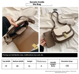 Detailed size chart and capacity guide for a vintage bicolor saddle crossbody bag