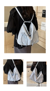 Detail of grey ruffled backpack with bow drawstrings and large interior capacity