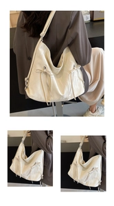 Detail showing creamy white pleated faux leather texture and decorative bow on hobo bag