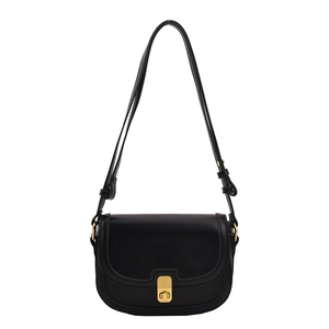 Classic black leather saddle bag with gold swivel lock and adjustable strap