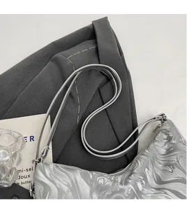 Silver PU leather underarm bag with fluid marble texture and sleek shoulder straps