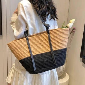 Chic khaki and black woven tote bag with contrast shoulder straps for summer beach style