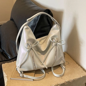 Sac à dos chic crème nacré avec détails de nœuds et doubles bretelles pour le quotidien