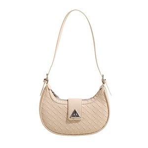 Minimalist beige woven leather half-moon shoulder bag with triangular silver metal buckle