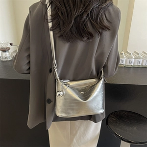 Chic silver metallic small square bag with shoulder strap and ball charm for women