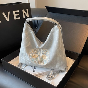 Silver pleated shoulder bag with floral embroidery and chain strap in luxury gift box
