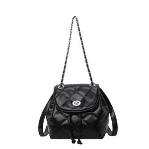 Quilted black leather mini backpack with silver metal chain straps and twist lock closure
