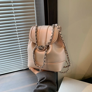 Pink mini chain bucket backpack with metal twist lock and smooth leather finish