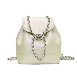 Modern pistachio green leather backpack with silver chain strap and metal swivel lock