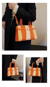Detailed views of an orange and white snakeskin Kelly bag with golden buckle