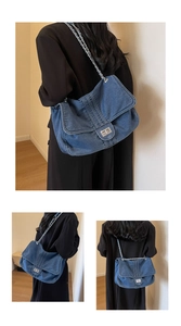 Detailed close-up of washed denim tote with silver metal chain strap and turn-lock closure