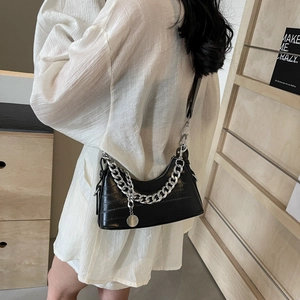 Chic black crocodile embossed underarm bag with decorative silver metal chain strap