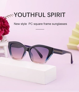 Detail of gradient purple lenses and cat-eye PC frame with metallic temple stripes