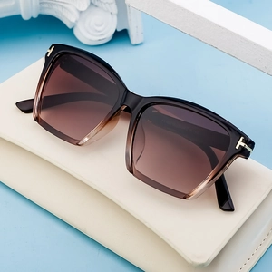 Polarized cat-eye sunglasses for women with brown gradient lenses and gold T-accents