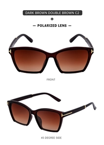Detailed macro view of dark brown polarized cat eye sunglasses with golden T-hinges