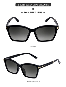 Close-up of cat-eye polarized sunglasses with gold T-shaped metal hinges and gradient lenses