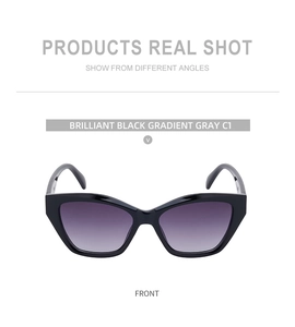 Front view of Y2K cat eye sunglasses in brilliant black with gradient gray lenses