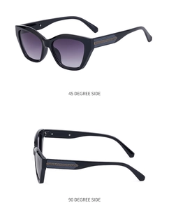 Detail view of cat eye sunglasses showing 45 and 90 degree side with metal accents