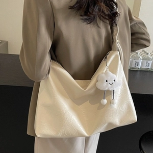 Minimalist large capacity tote bag with pleated texture and plush cloud charm detail