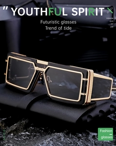 Detail of futuristic black matte rectangle sunglasses with golden diamond texture temples