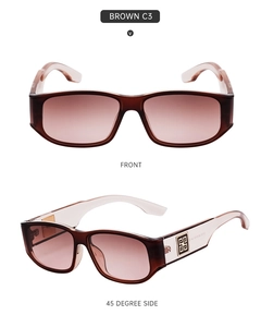 Detail view of brown square sunglasses with gradient lenses and metal logo on the temple