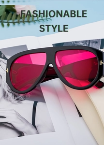 Fashionable oversized aviator sunglasses with pink lenses and black frame detail