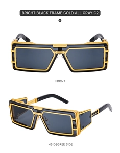 Detail view of square black and gold metal sunglasses with C2 gray lenses and wide temples