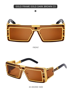 Close-up of luxury gold frame rectangular sunglasses with dark brown lenses and black temples