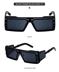 Detail view of bold black square frame sunglasses with dark gray lenses and mechanical hinges