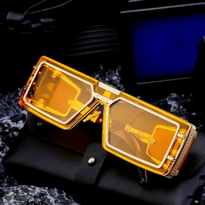 Futuristic punk sunglasses with gold metal frame and yellow transparent lenses for men