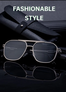 Detail of square double-bridge sunglasses with champagne gold frame and black leather case