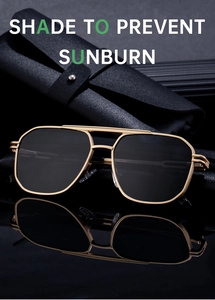 Detail of square pilot sunglasses with gold metal frame and double bridge on black pouch