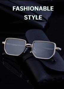 Detail of silver square metal sunglasses with double rivet hinges and grey lenses