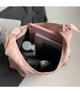 Pink oversized tote bag interior showing ample space for tablets, books and essentials