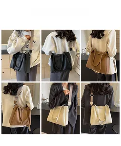Detail view of large tote bags in three colors with patterned wide woven straps