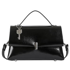 Vintage black faux leather crossbody bag with silver key pendant and top handle design