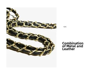 Close-up of gold metal chain woven with black leather strap on luxury bucket bag