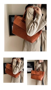 Detail of caramel crocodile pattern on high-quality faux leather tote bag for women