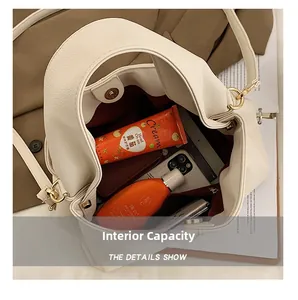 Detailed top view of the cream tote bag interior showing large storage capacity