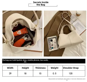Size guide for large PU tote bag showing 29x18x15cm dimensions and capacity details