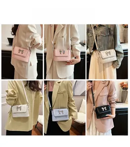 Detailed views of crossbody bucket bags with butterfly buckles in multiple colors