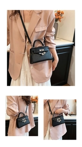 Detailed views of a black embossed trapezoid handbag with silver buckle and top handle