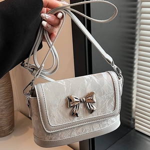 Minimalist creamy white marble pattern crossbody bag with silver butterfly buckle detail