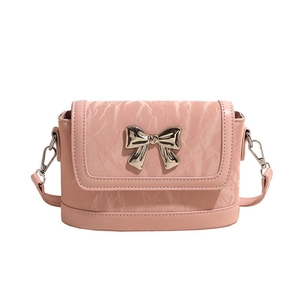 Pink pleated leather crossbody bucket bag with decorative golden butterfly clasp