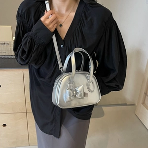 Silberne Metallic-Muscheltasche mit Schleife, stylische Umhänge- und Handtasche für Damen