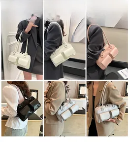 Detail shots of minimalist rectangular shoulder bags with double front pockets and twin straps