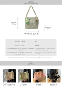 Detailed view of fashionable pleated bucket bag with metal chain and plush charm