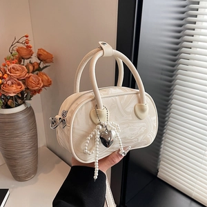 Elegant cream white marble texture handbag with pearl heart charm and dual handles