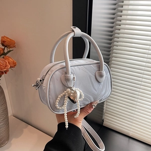 Light blue marble pattern Boston handbag with pearl heart charm and top handle
